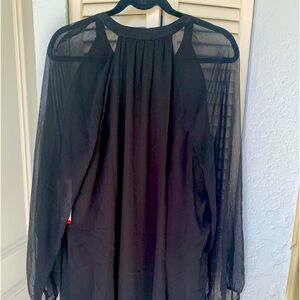 Lovely black dress . Covered buttons. Ballon sleeve. Dress fully lined